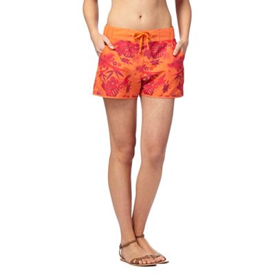 Orange tropical floral print board shorts